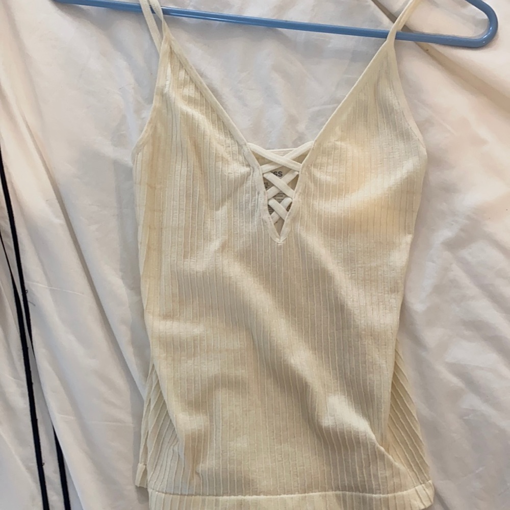 Express rib tight tank top with cross. Size xs